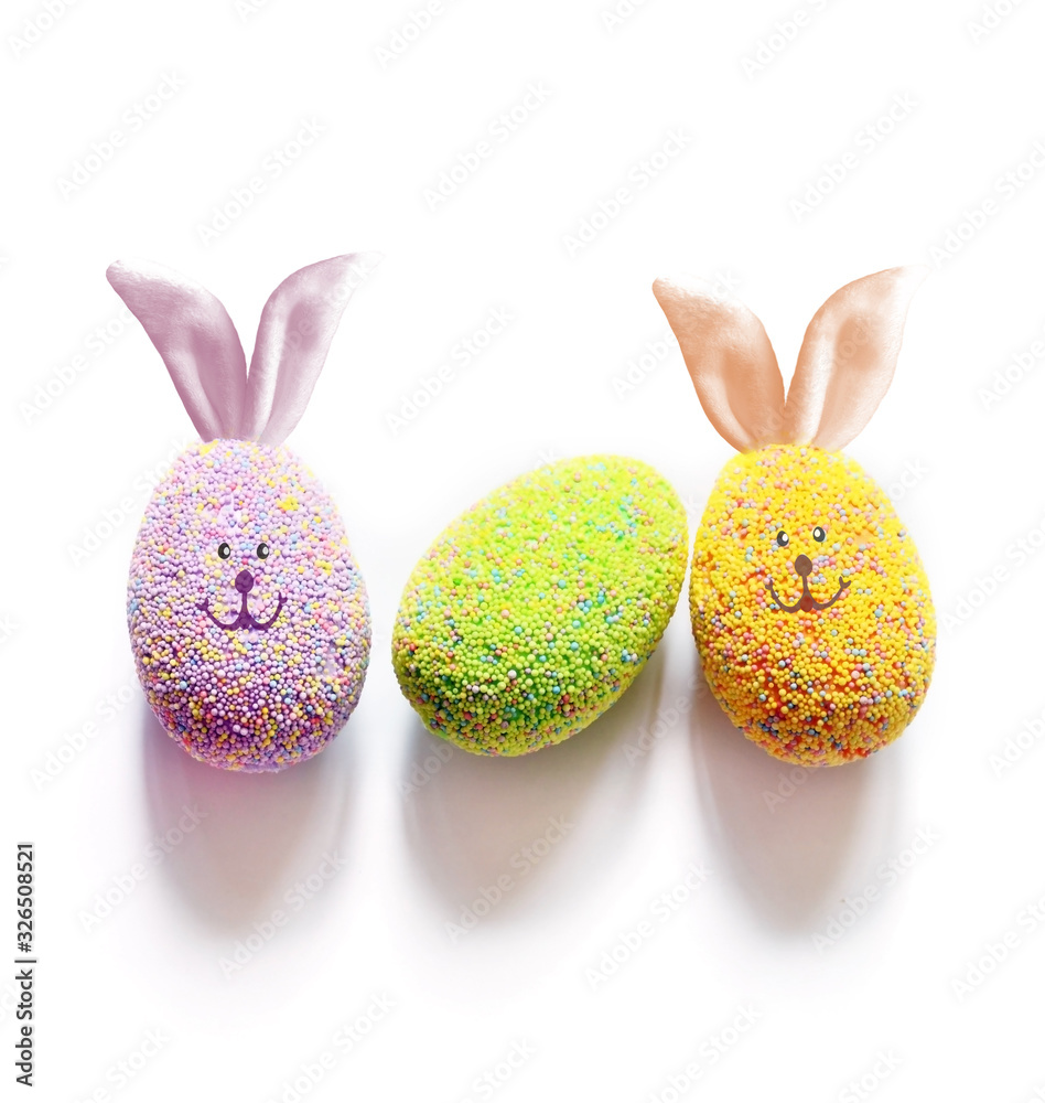 Colored easter eggs on a white background. Holiday concept. Colored easter eggs on a white background. Holiday concept.