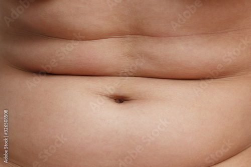 closeup of abdominal surface woman fat