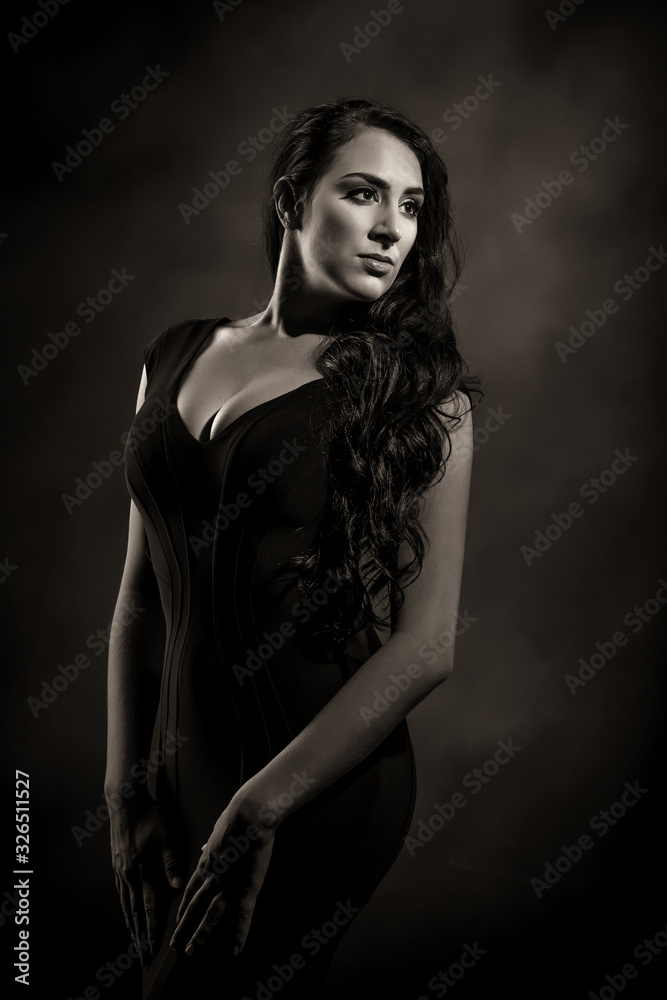 Brunet Girl in Black Dress Dark Background