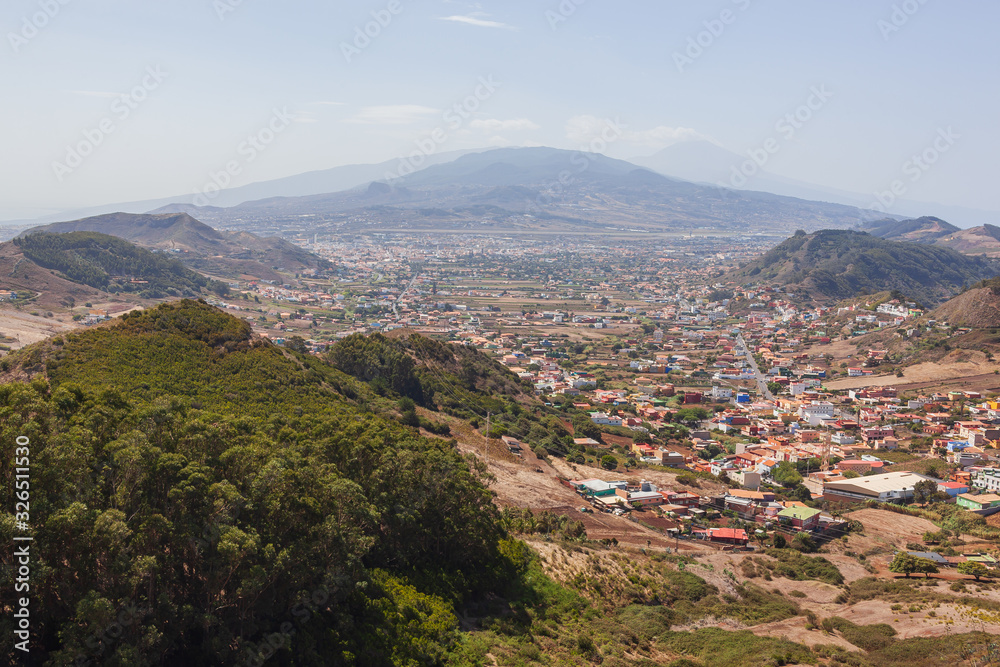 Aerial view on the vast valley and La Laguna village surrounded with Anaga massif, Tenerife, Canary Islands, Spain.