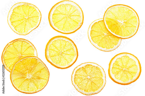 dried slices of orange isolated on a white background. top view