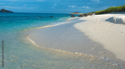 Deserted beaches with white sands and clear waters on Espanola Island, Galapagos Islands, Ecuador photo