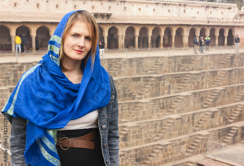 Tourists is exploring ancient Indian step well, Architecture of stairs at Abhaneri baori stepwell in Jaipur, Rajasthan india. photo