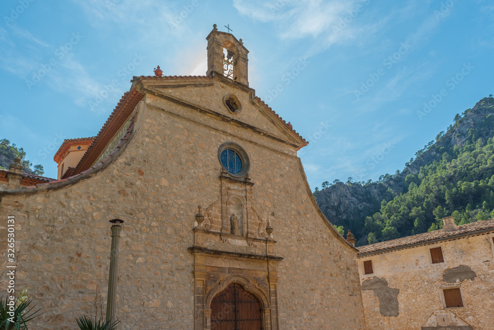 Sanctuary of La Fontcalda, Catalonia, Tarragona, Spain view to to door and bell