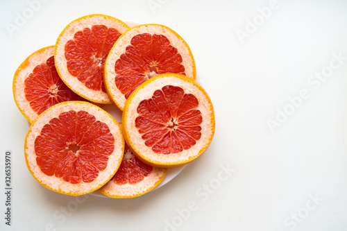 grapefruit on a white background with space for text