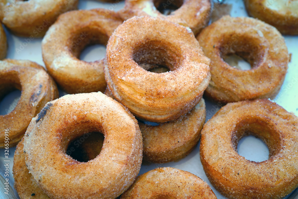 Fresh baked donuts with cinnamon sugar