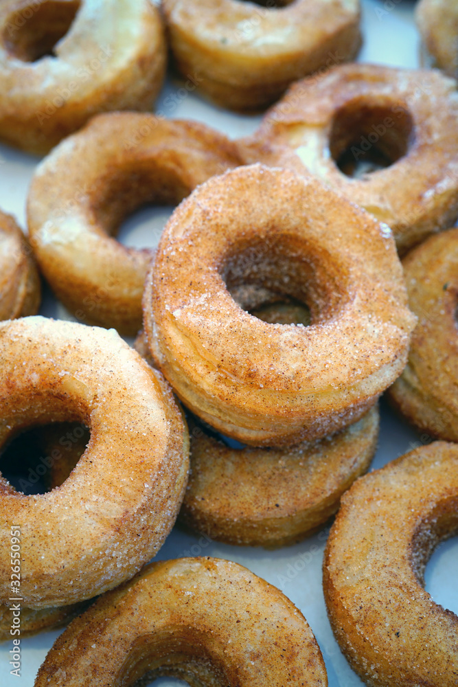 Fresh baked donuts with cinnamon sugar