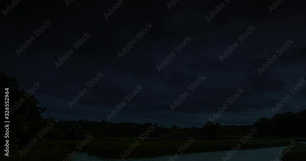 Thunderstorm clouds at night with lightning. 4K Timelapse Loop. night storm cloud landscape. Impressive lightning storm sky. Several powerful flashes and lights. Thunderstorm clouds at night with lightning. 4K Timelapse Loop. night storm cloud landscape. Impressive lightning storm sky. Several powerful flashes and lights.