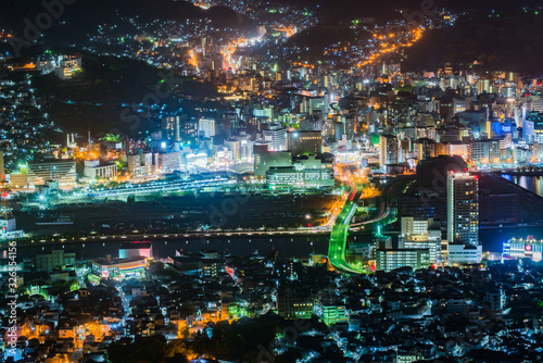 View of Nagasaki city at night taken by telephoto lens from Mount Inasa observation platform  Nagasaki  Japan 