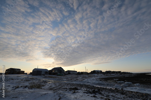 Evening view of an arctic community and neighbourhood, located in Arviat, Nunavut Canada