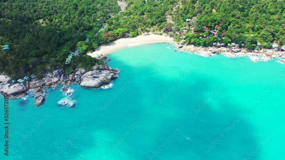 Ao Than Sadet, crystal clear calm turquoise water and secluded sandy beach on the island with rainforest. Thailand Ao Than Sadet, crystal clear calm turquoise water and secluded sandy beach on the island with rainforest. Thailand