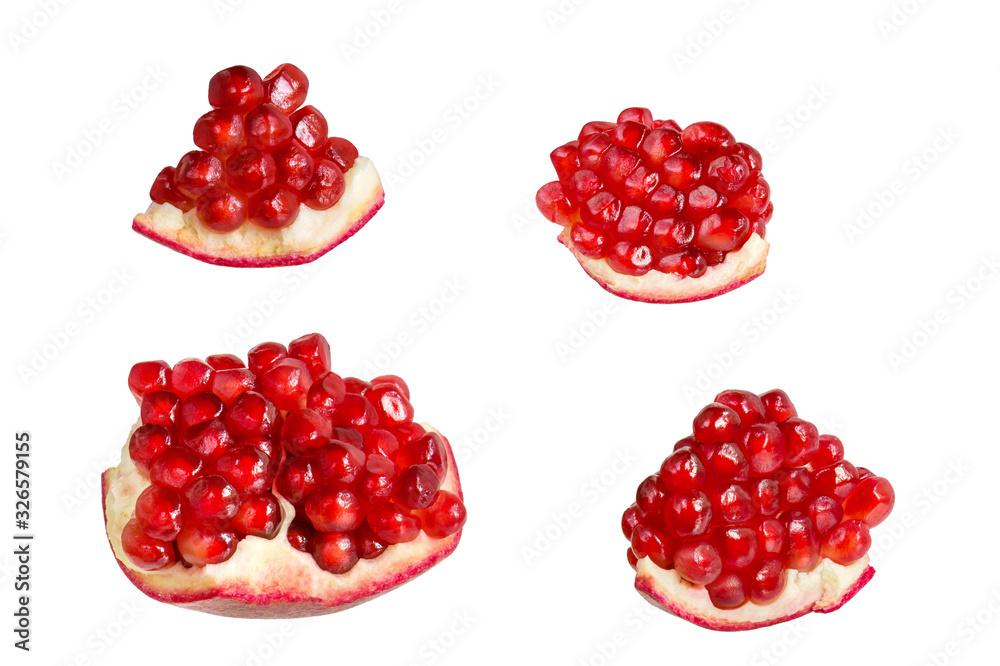 Pomegranate slices with juicy grains isolated on white background Pomegranate slices with juicy grains isolated on white background