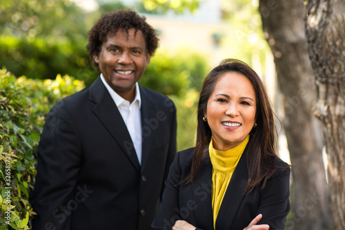 Portrait of an African American Businessman and Asian Businesswoman.