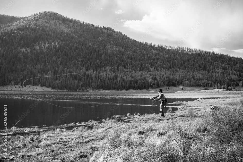 Fly-fisherman at the lake