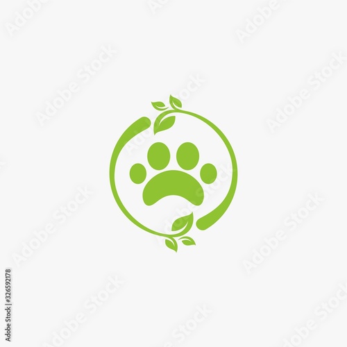 Green leaf logo design. Bio natural sign vector. Circle foot print icon design.