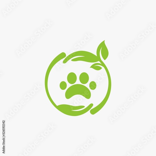 Green leaf logo design. Bio natural sign vector. Circle foot print icon design. photo