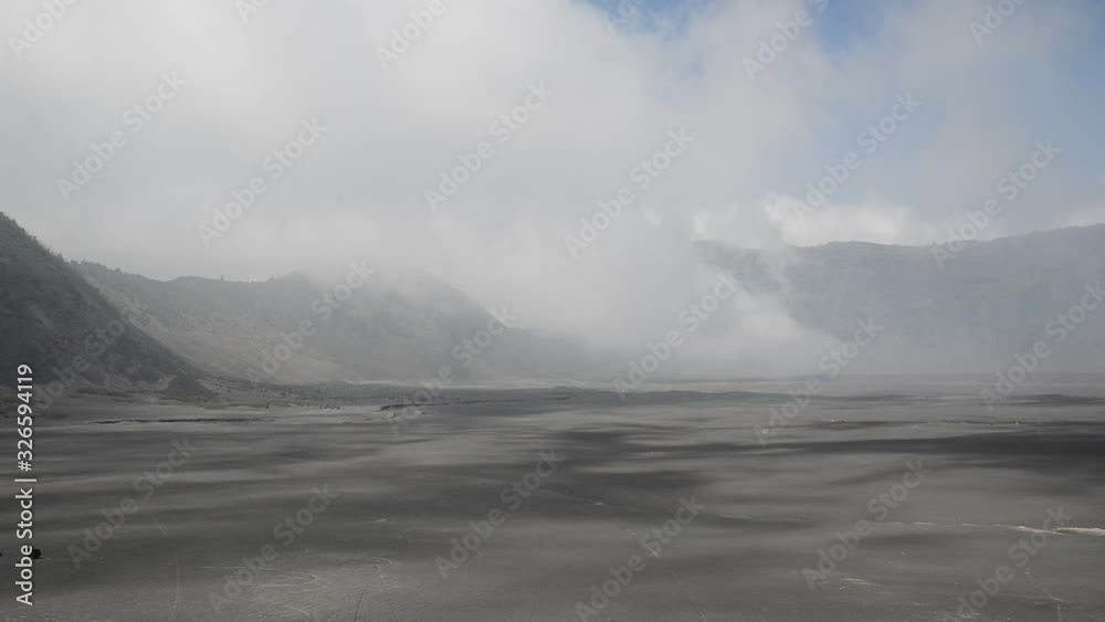 the formation of a steam storm in the Whistling Sands desert in Java, Indeonesia. the formation of a steam storm in the Whistling Sands desert in Java, Indeonesia.