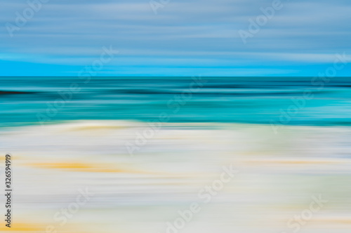 Abstract seascape background. Stormy ocean  and beautiful cloudy sky. Line art  motion blur  blue  turquoise  yellow colors