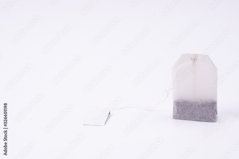 Naklejka premium tea bag on a white background