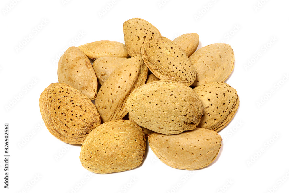 Almonds in their shell isolated on a white background. Almonds raw. Almonds in their shell isolated on a white background. Almonds raw.