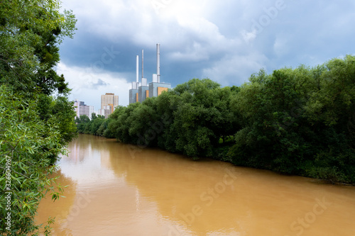 The Ihme, a river in Hanover, Germany full of mud due to heavy rain photo