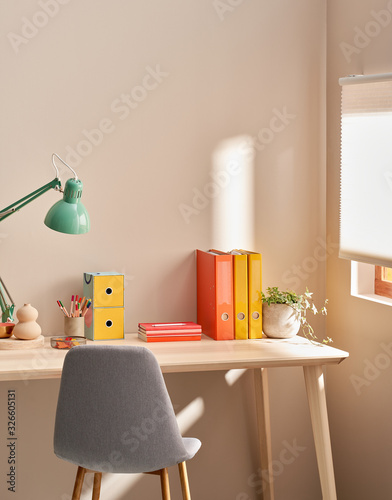 Interior of cozy workspace near window