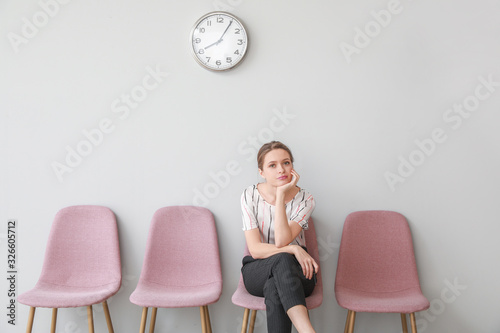 Young woman waiting for job...