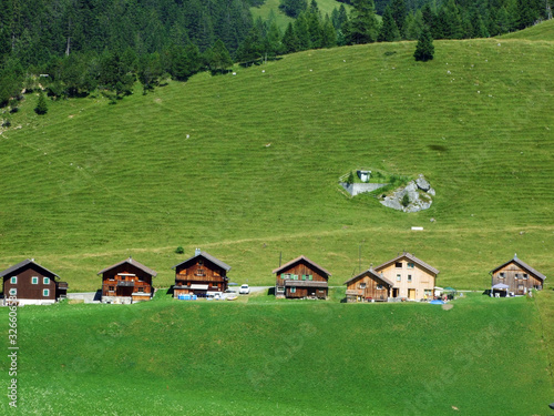 An old tourist-livestock alpine settlement in the Saminatal valley and along an artificial lake Gänglesee (Ganglesee or Gaenglesee) - Steg, Liechtenstein photo