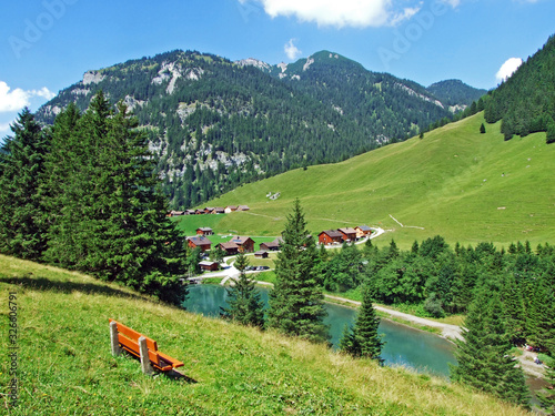 An old tourist-livestock alpine settlement in the Saminatal valley and along an artificial lake Gänglesee (Ganglesee or Gaenglesee) - Steg, Liechtenstein photo