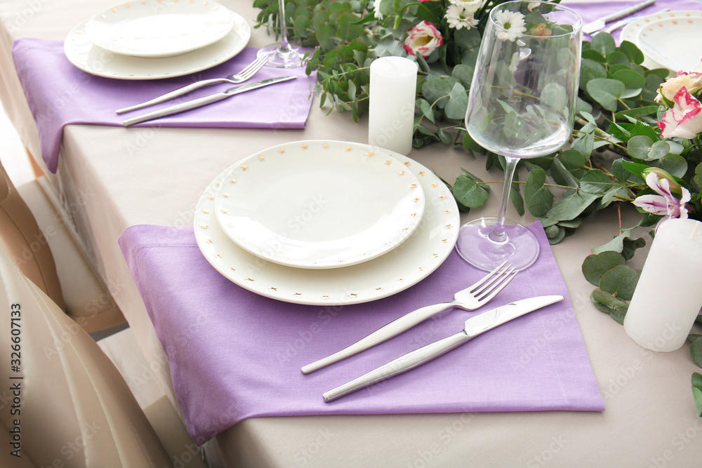 Beautiful table setting for wedding celebration in restaurant Beautiful table setting for wedding celebration in restaurant