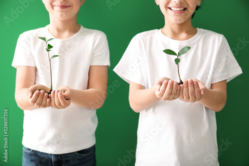Little children with plants...