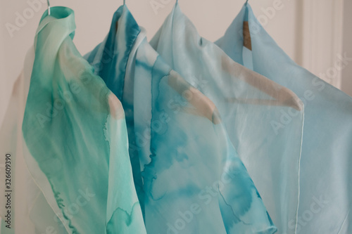  Natural dyes  silk - sustainable fashion background - silk scarves- pastel tone - bright blue color