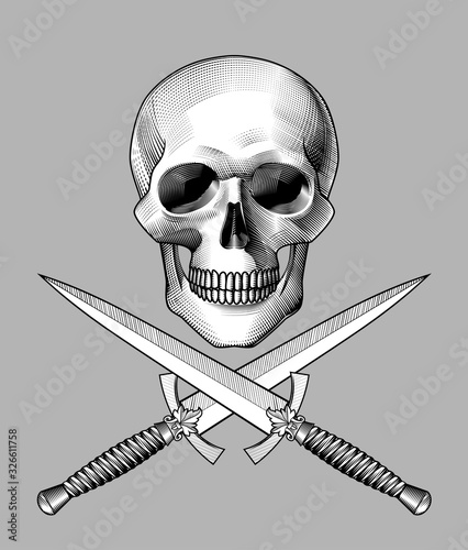 Human skull full face with crossed dagger with a decorative handle and bone.