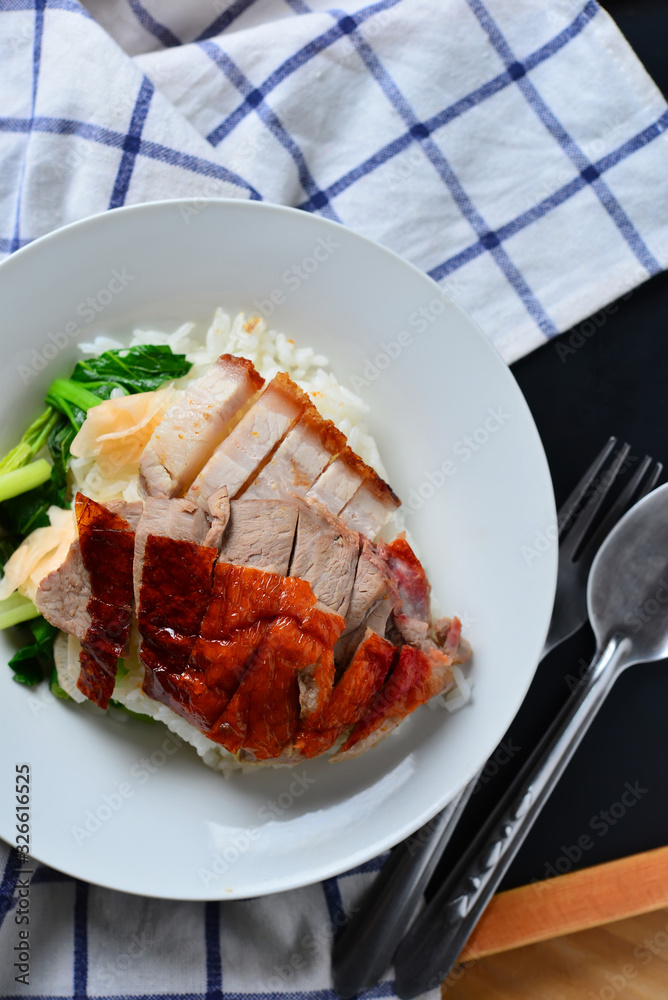 Rice with roasted duck and crispy skin pork belly Stock Photo | Adobe Stock