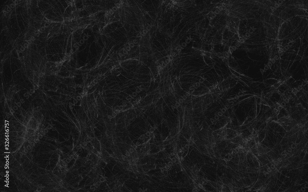 Black background with marble texture with scratches and scuffs.
