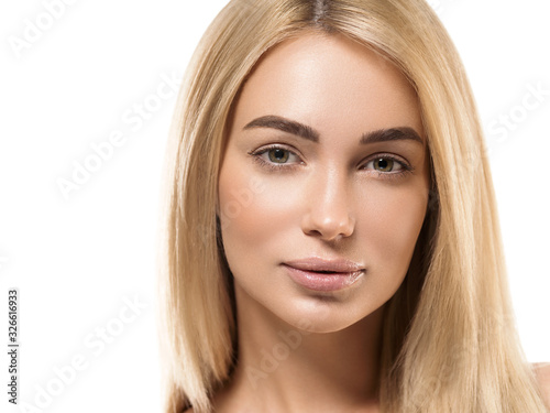 Beautiful face woman long blonde hair natural make up clean skin