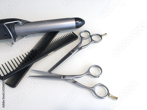 A set of tools for the work of a hairdresser. Background for the design of a beauty salon, website, barbershop.