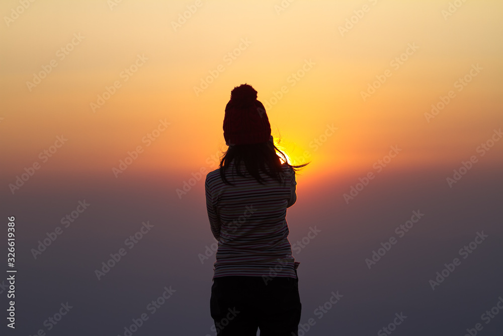 silhouette of woman at sunset silhouette of woman at sunset
