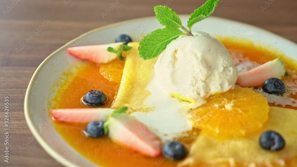 crepe suzette with vanilla ice-cream and fresh fruit crepe suzette with vanilla ice-cream and fresh fruit
