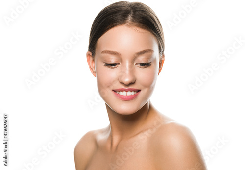 Woman face clean skin looking down eyes without make up fresh clean beauty model