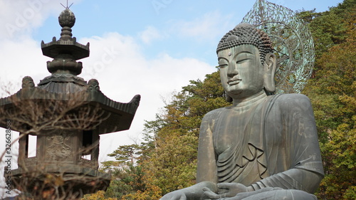 Big statue of the Buddha in the Sinheungsa temple in autumn in Seoraksan national park  mount Sorak  Sokcho  South Korea.