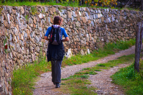 Woman hiker with backpack