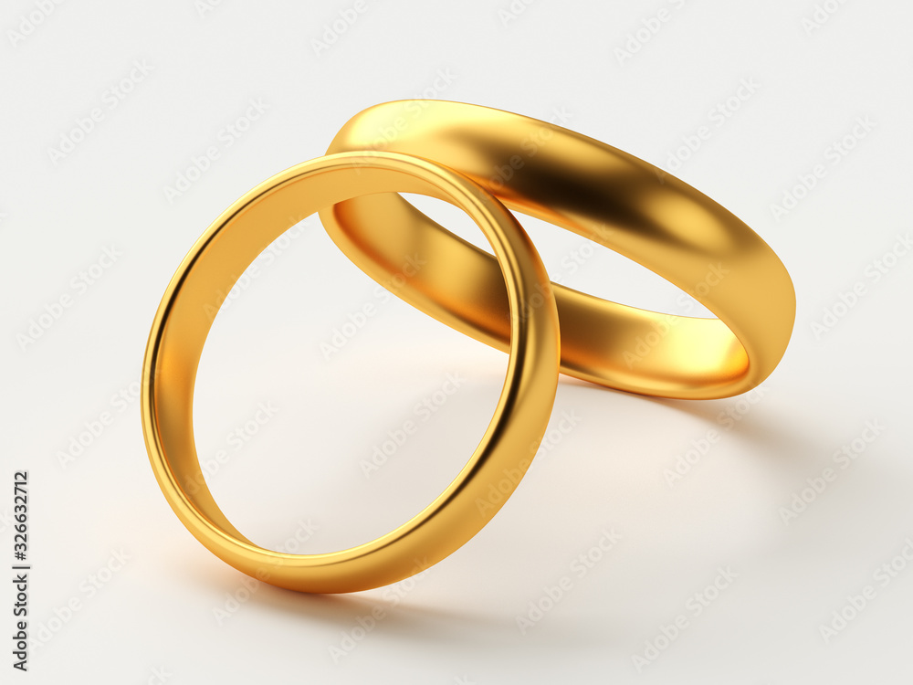 Wedding gold rings lie on each other Wedding gold rings lie on each other