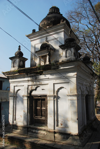 Votive temples and shrines in a row at Pashupatinath Temple, Kathmandu, Nepal. photo