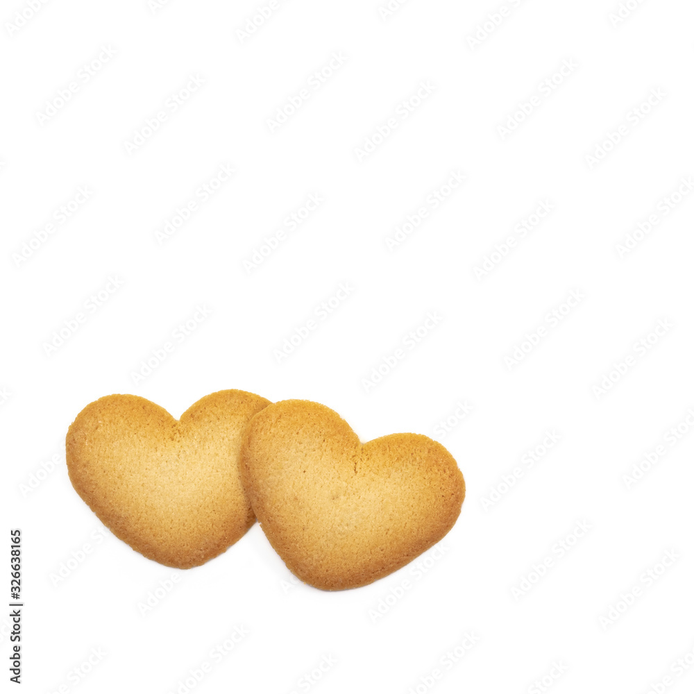 Obraz premium The close up of love heart shape cookie on white background for Valentine's day.