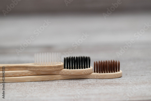 Sustainable lifestyle zero waste concept.. brushes for washing dishes and bamboo toothbrushes   plastic free items. top view