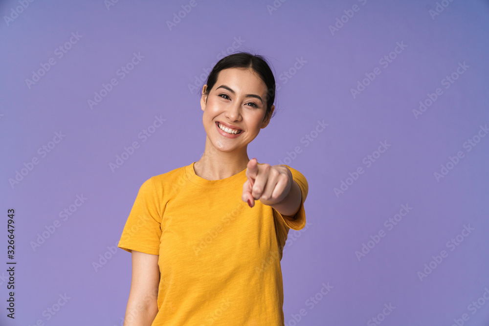 Cheerful young pretty sportswoman standing Cheerful young pretty sportswoman standing