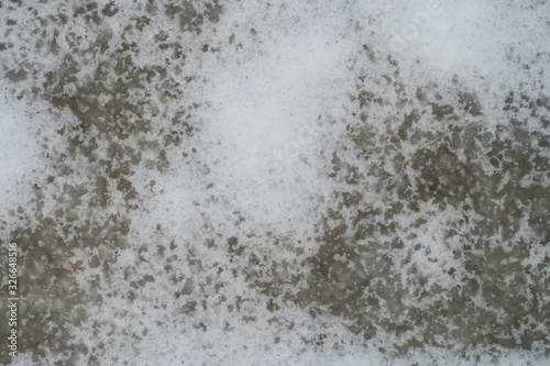 Melting snow texture background © PixieMe