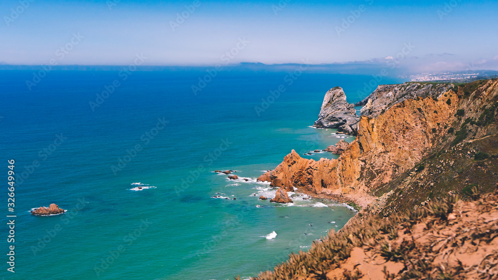 Cape Roca, Portugal. High hills and cliff over the Atlantic ocean. enjoying panoramic sea landscape. Picturesque seascape with rocky cliff. The edge of the land. Cabo da Roca banner. copy space.