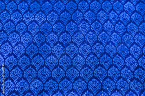 The image of the blue Thai silk pattern that is woven in Thailand.